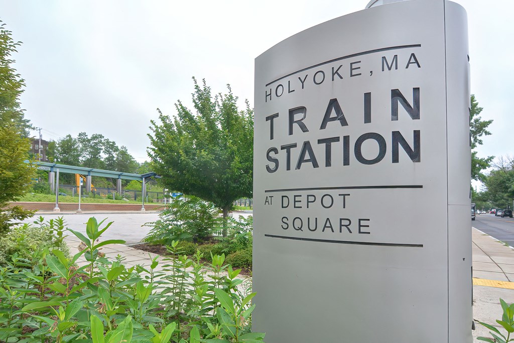 a sign for the hollywood metro train station at depot square