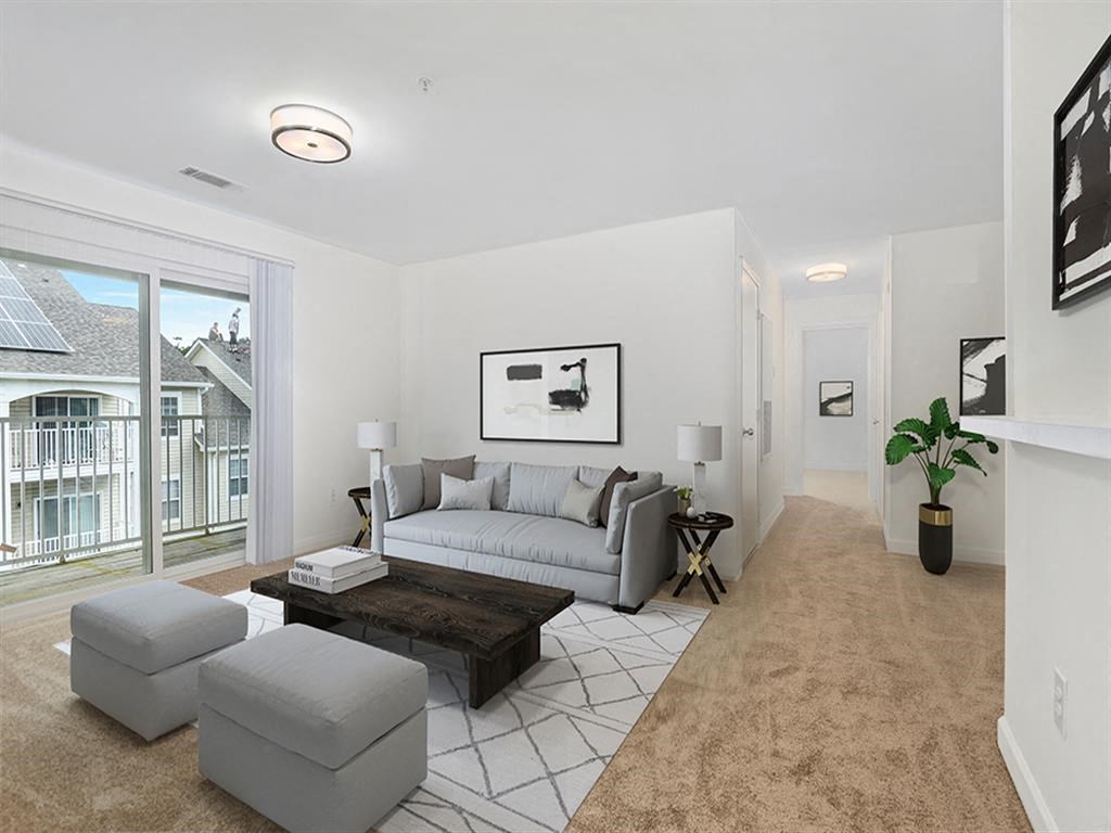 a living room with a couch and a table