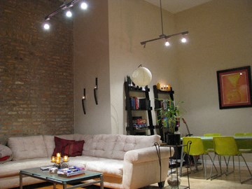 a living room with a couch and a table