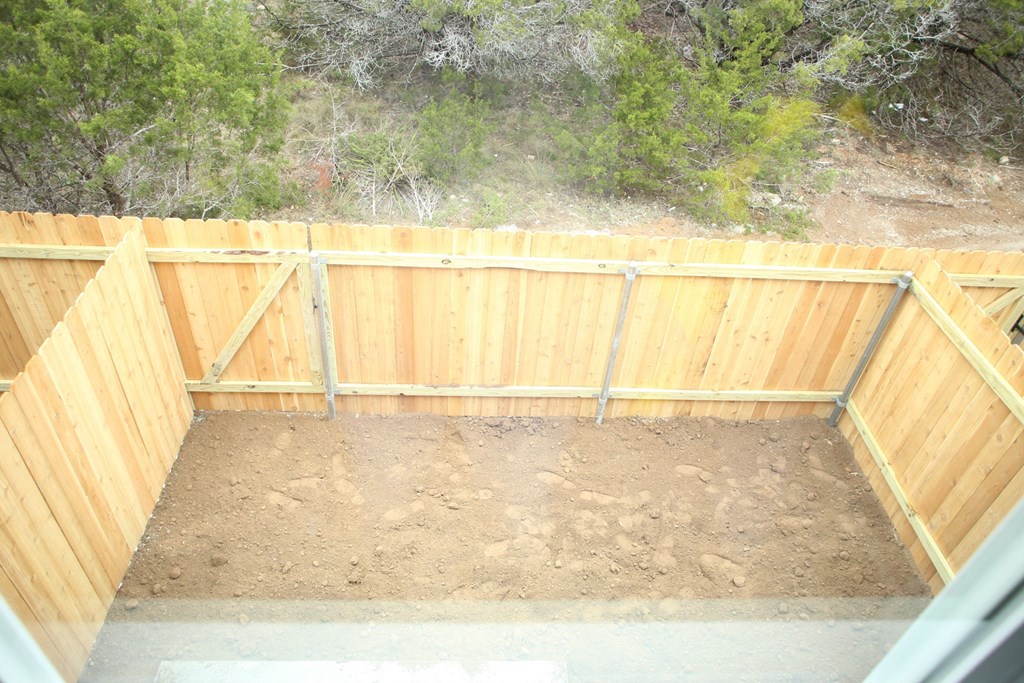 the end of the new fence in the chicken coop