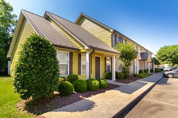 Exterior View of Dana Downs Apartment Homes with Lushly Landscaped Entrances and Walkways - Photo Gallery 2