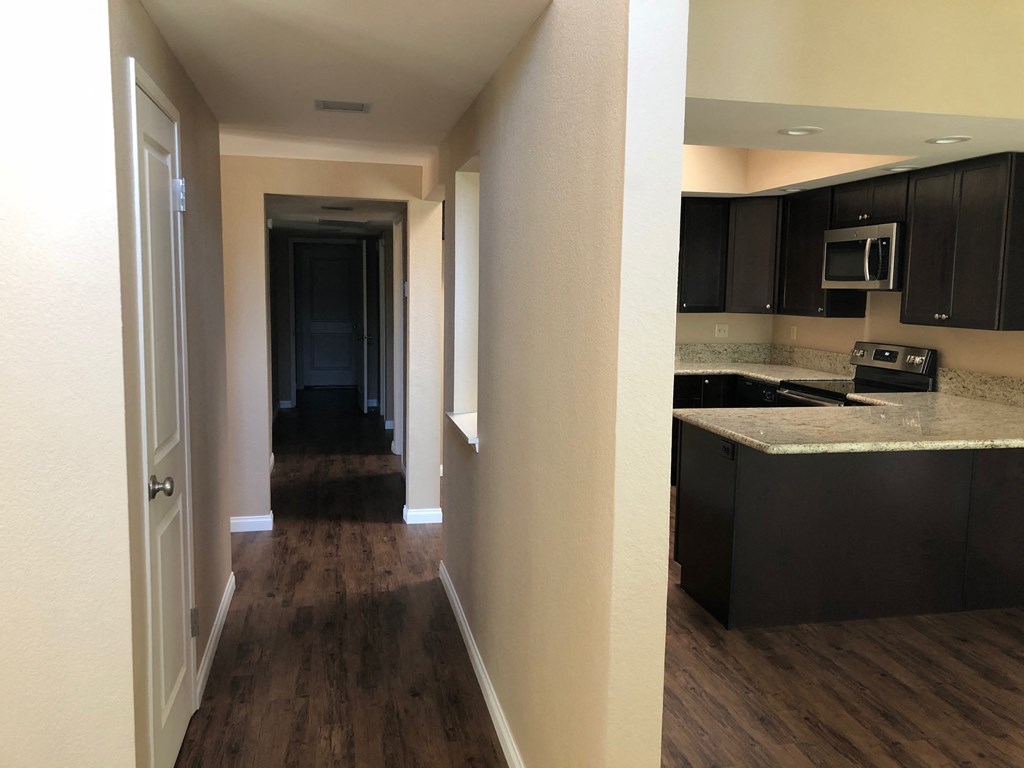 a view of the kitchen and hallway from the living room