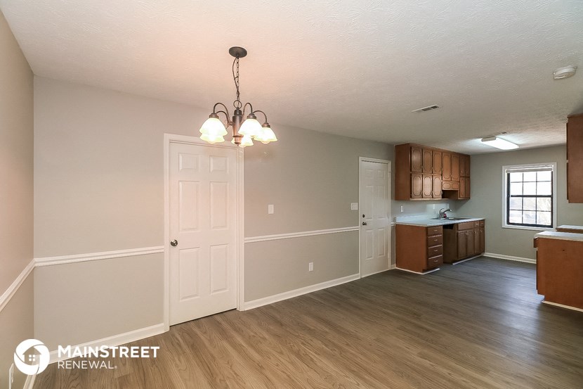 the kitchen and living room of an open floor plan