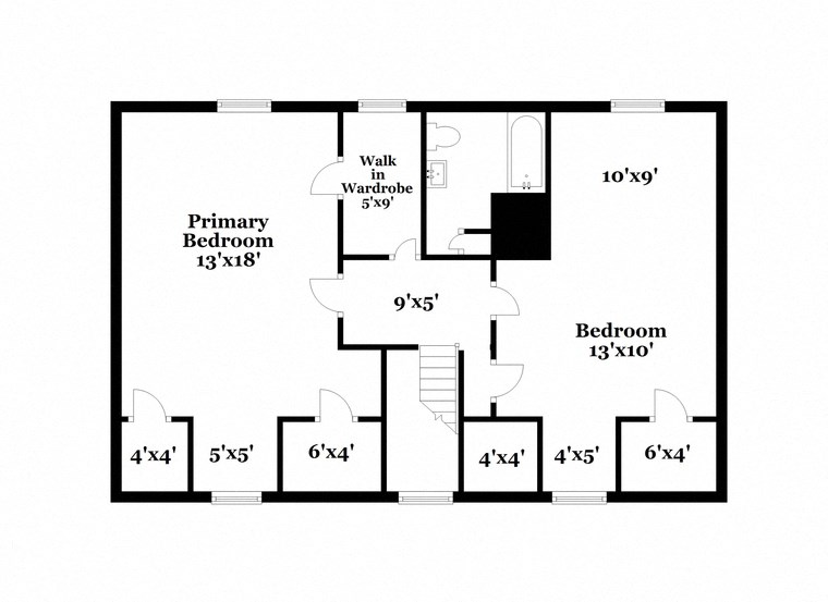 floor plan of the first floor of a house with bedrooms and baths