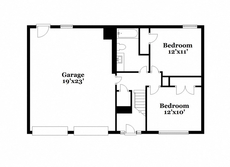 a floor plan of a house with a garage and a bedroom