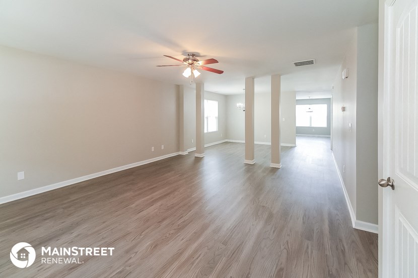 the living room and dining room are spacious and clean