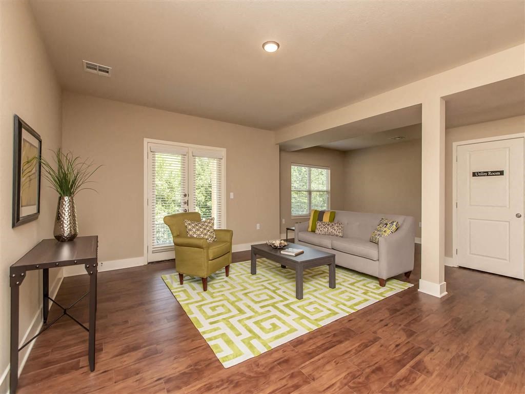 a living room with a couch and a table