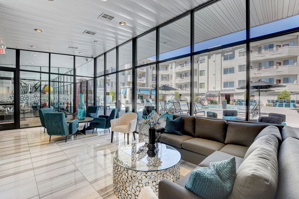 a living room with couches and a table