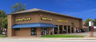 A Good Year storefront with a blue awning.