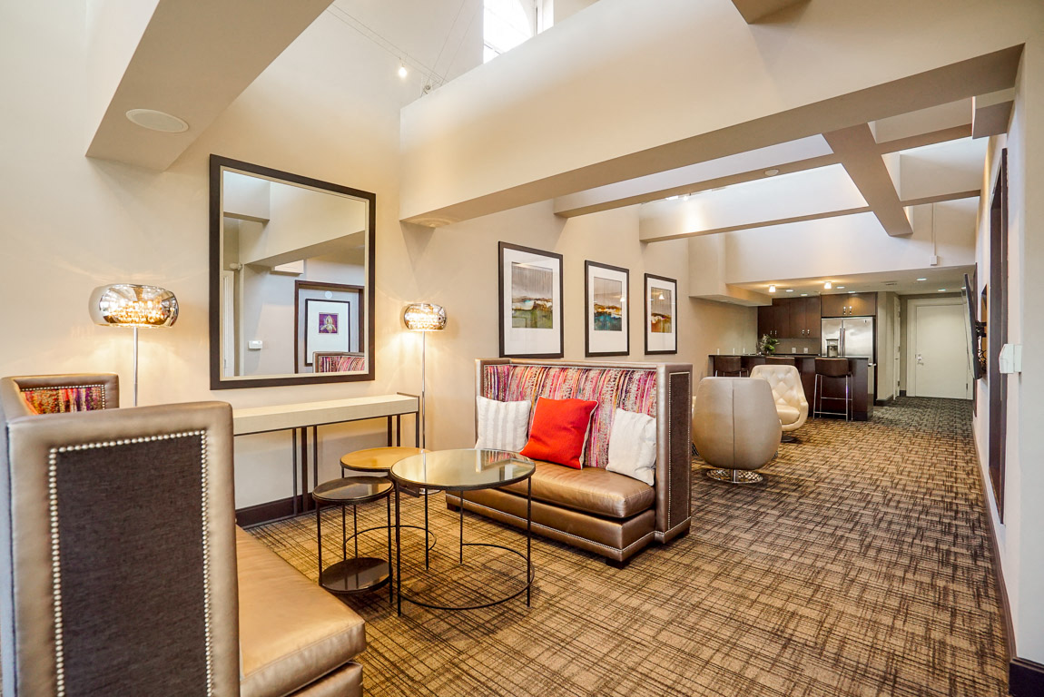 a living room with a couch and a table