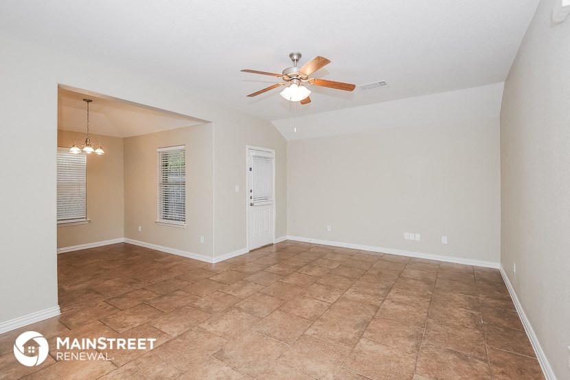 the spacious living room is clean and ready for you to use