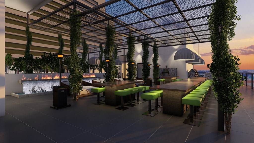 a rendering of a lounge area with tables and chairs and plants