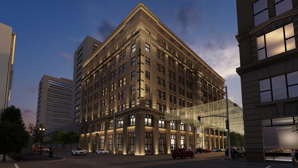 a rendering of a building on the corner of a city street