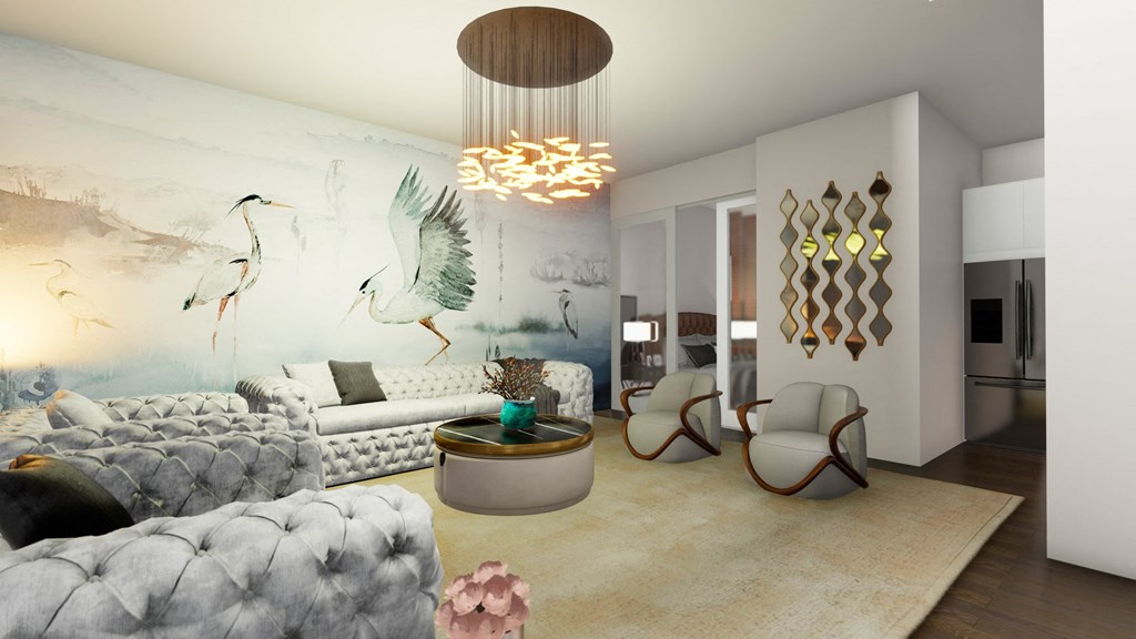 a living room with couches and chairs and a wall mural