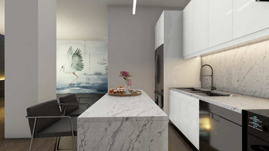 a kitchen with a marble counter top and a table with chairs
