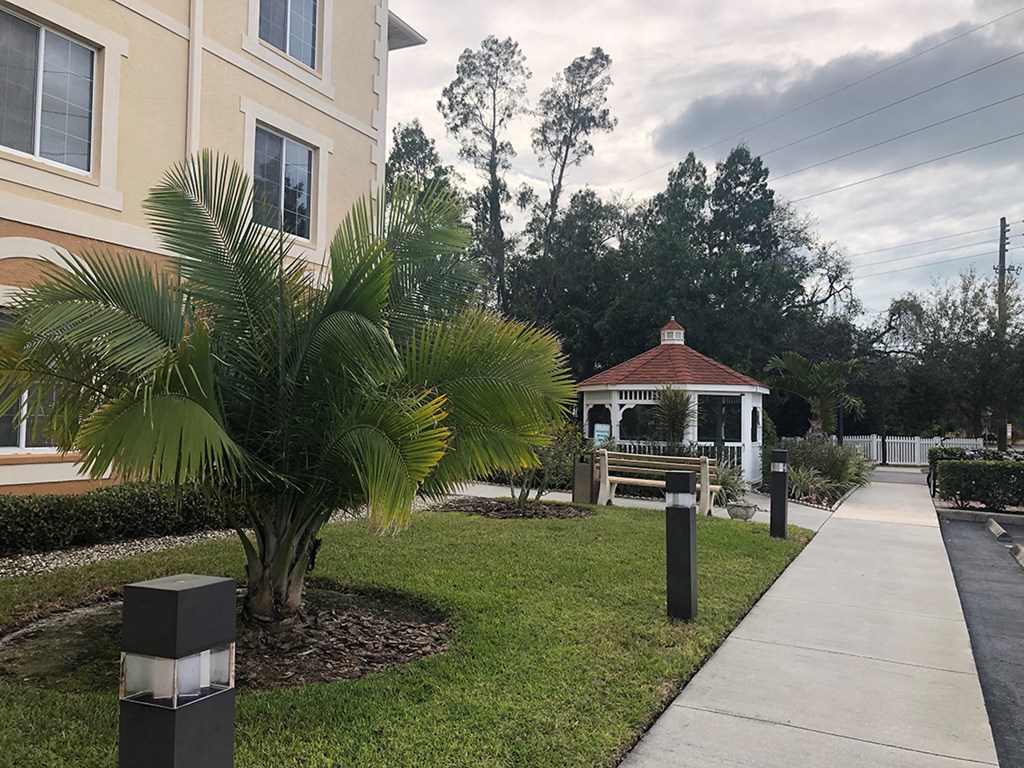 neatly manicured sidewalks at Villa San Marcos