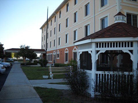 residents enjoy a screened gazebo at Villa San Marcos
