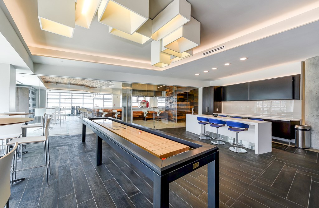 a shuffleboard table in the lobby of an office building