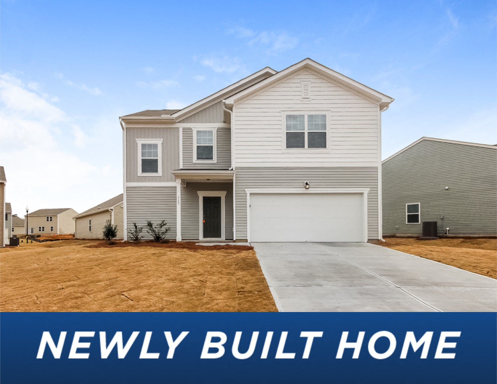 a new build home with a garage door