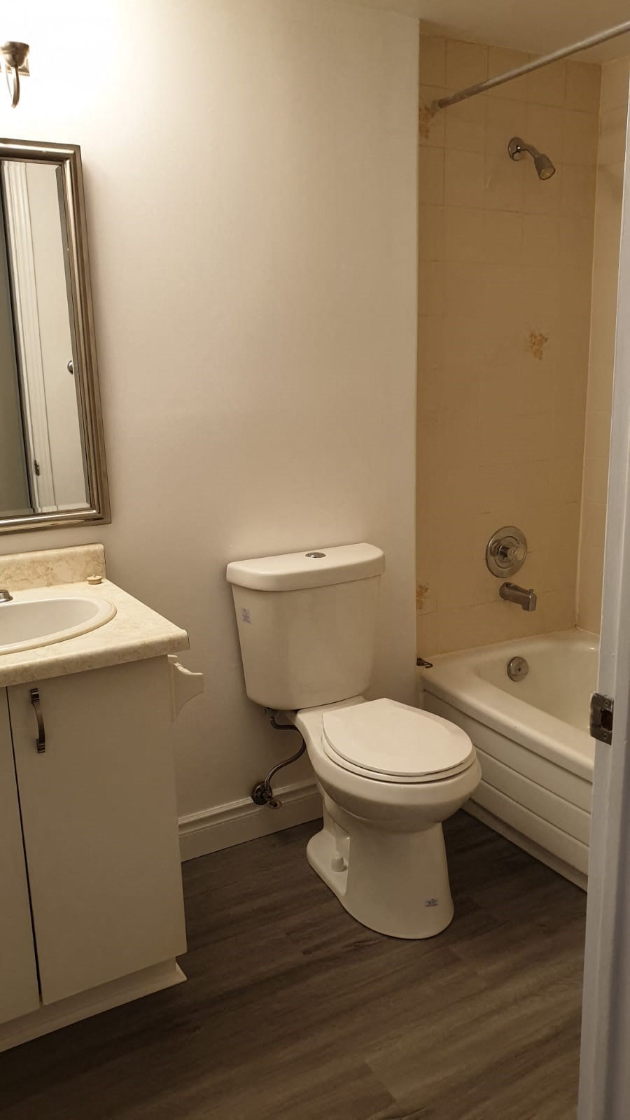 a bathroom with a toilet and a sink