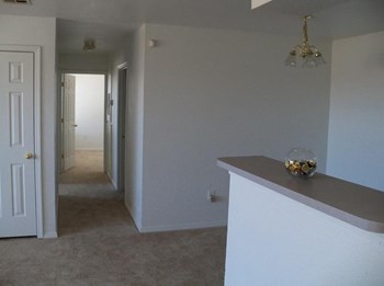 Neutral colors in living spaces in  the Gardens at Pryor Creek Apartments - Photo Gallery 12