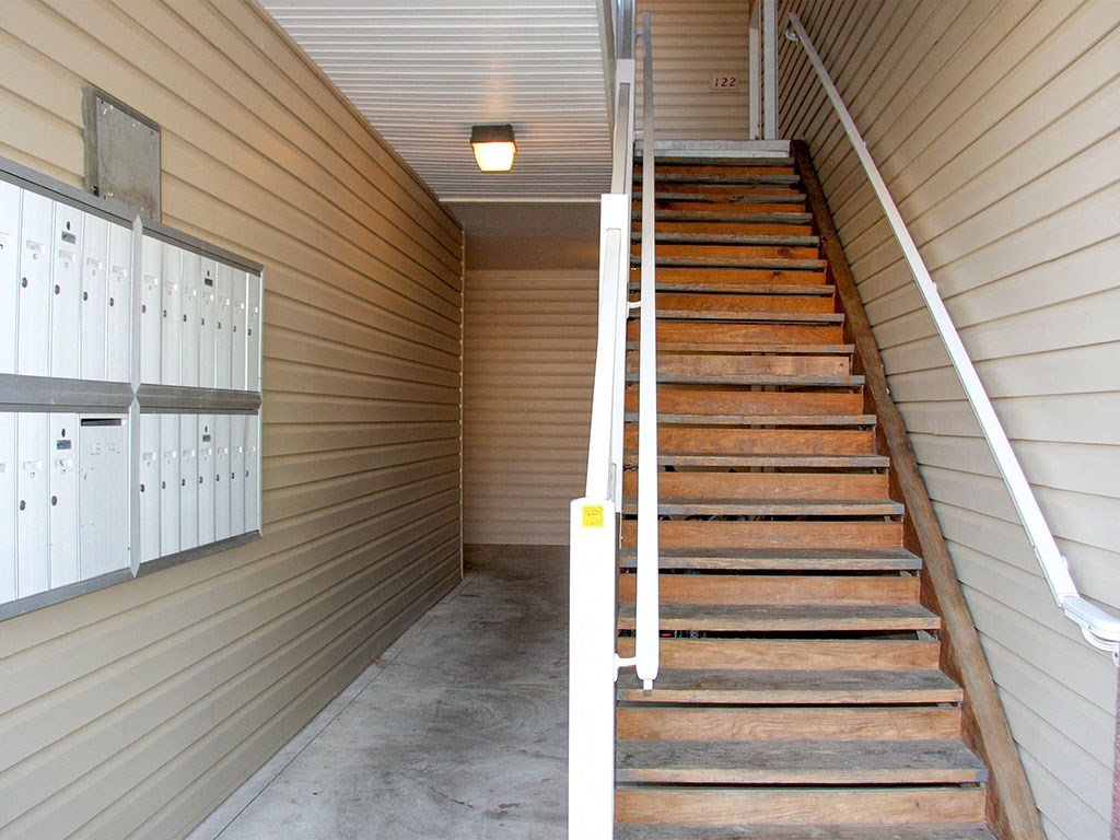 the stairs leading up to the locker rooms are empty
