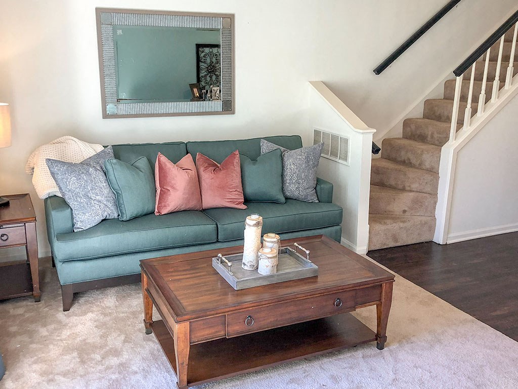 a living room with a couch and a coffee table