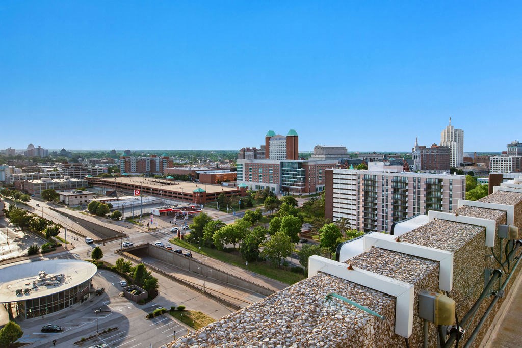 a view of the city from the roof of a building