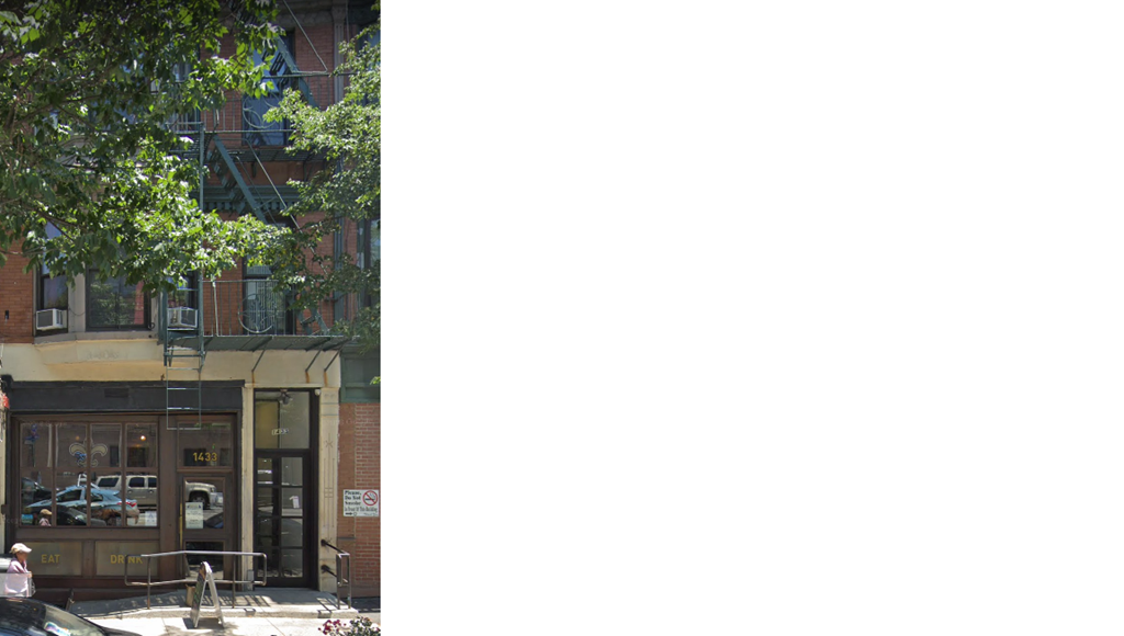 the store is located on the corner of a city street