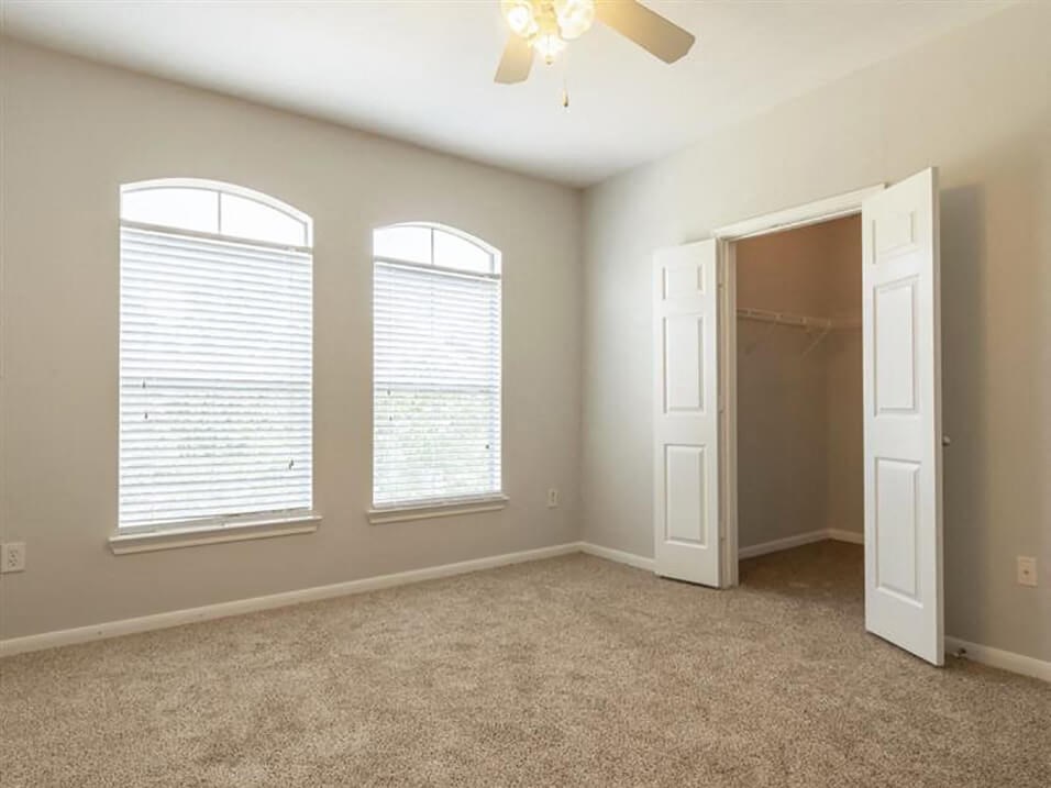 bedroom with walk-in closet