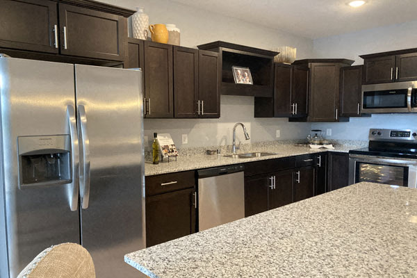 kitchen with dark cabinets