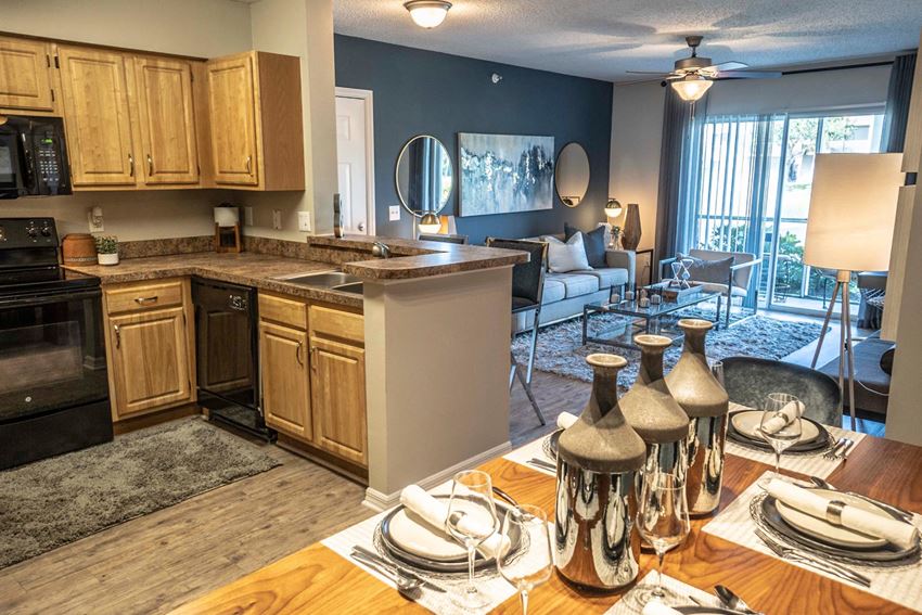 Furnished Living Cum Kitchen at Pine Lakes Preserve, Port St. Lucie, FL - Photo Gallery 1