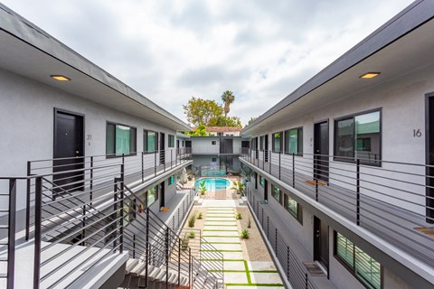 Outdoor courtyard area leading to pool