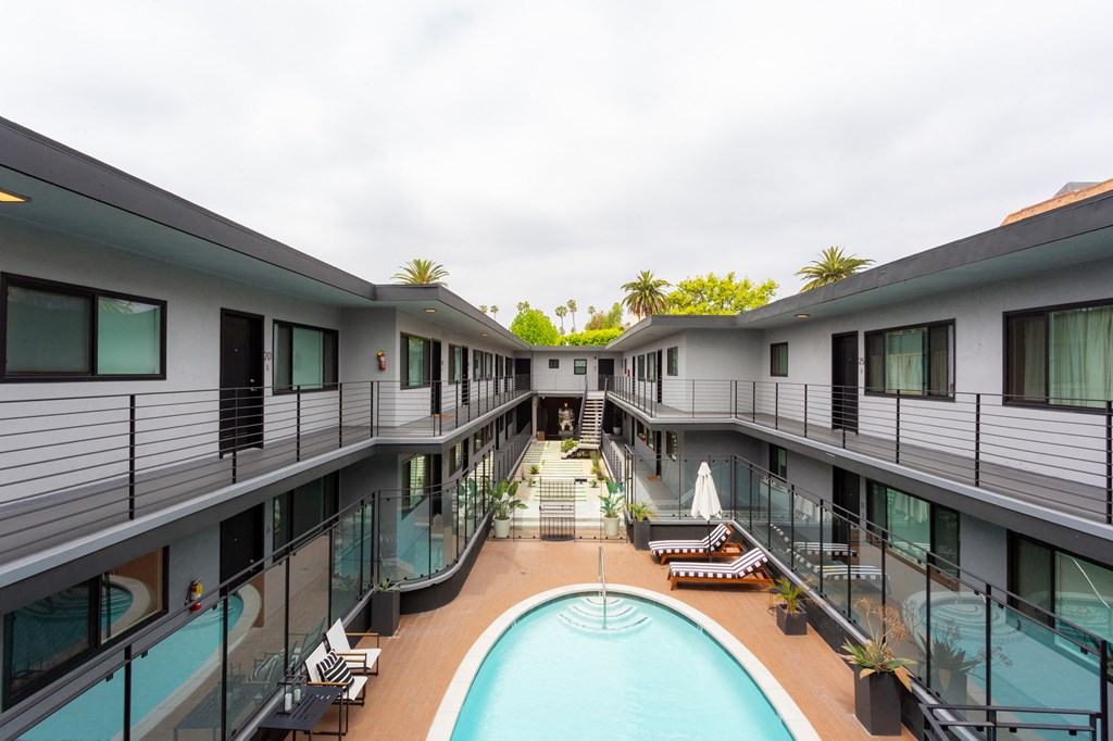 Outdoor pool with lounge chairs