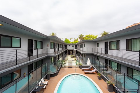 Outdoor pool with lounge chairs