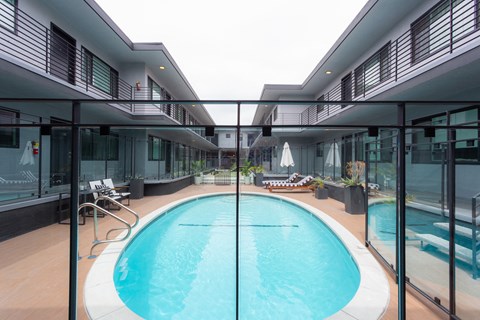 Pool surrounded by glass walls
