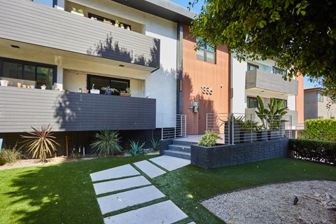 Exterior with patios and greenery