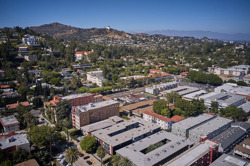 Aerial view with city and mountains behind