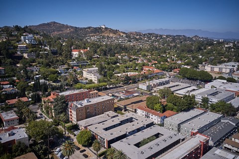 Aerial view with city and mountains behind