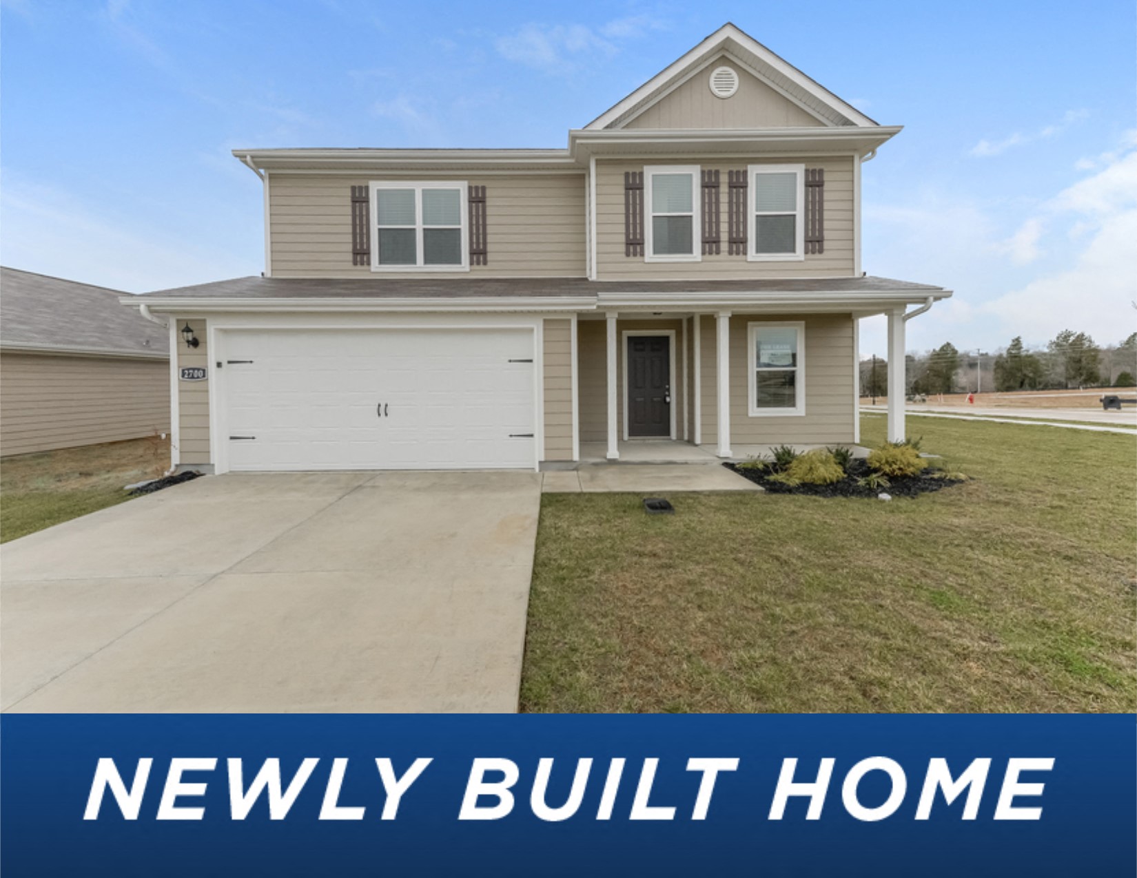 a new build home in a neighborhood with a lawn