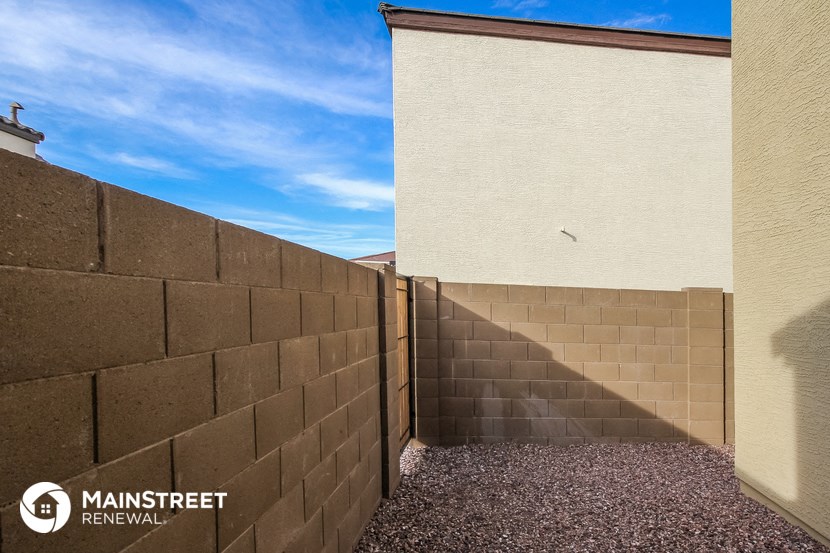 a retaining wall in front of a building
