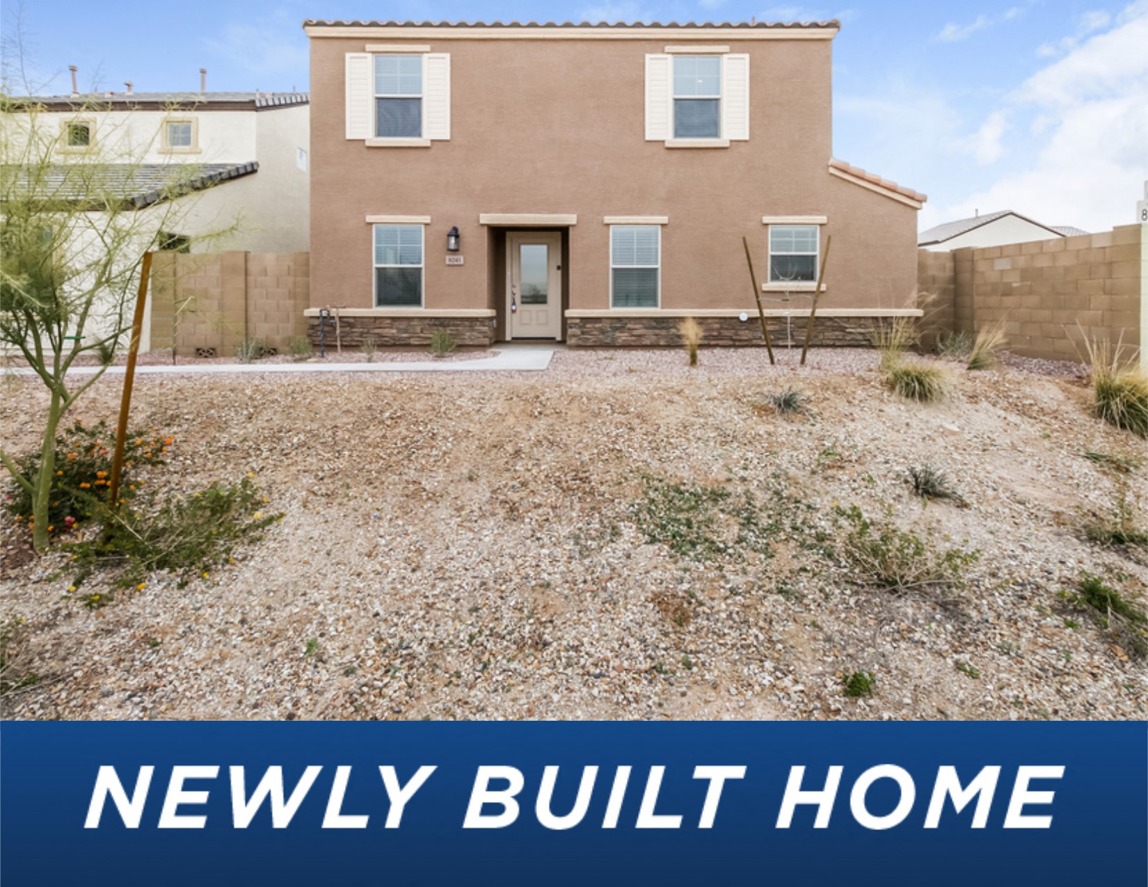 a new build home with a gravel yard