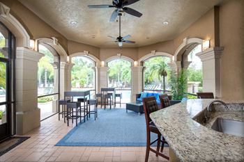 Screened Outdoor Kitchens at The Grand Reserve at Tampa Palms Apartments, Tampa