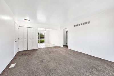 Lascivious Living Room Area at Rivershell Apartments, Lansing, MI