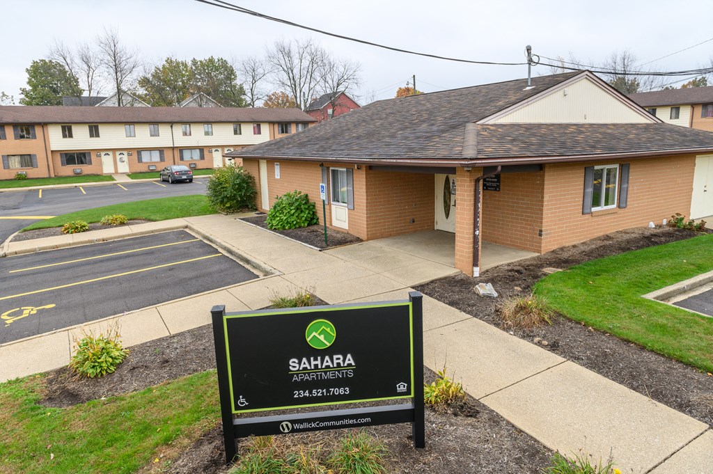 a building with a sign in front of it