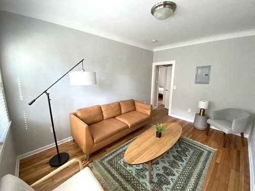 a living room with a couch and a coffee table