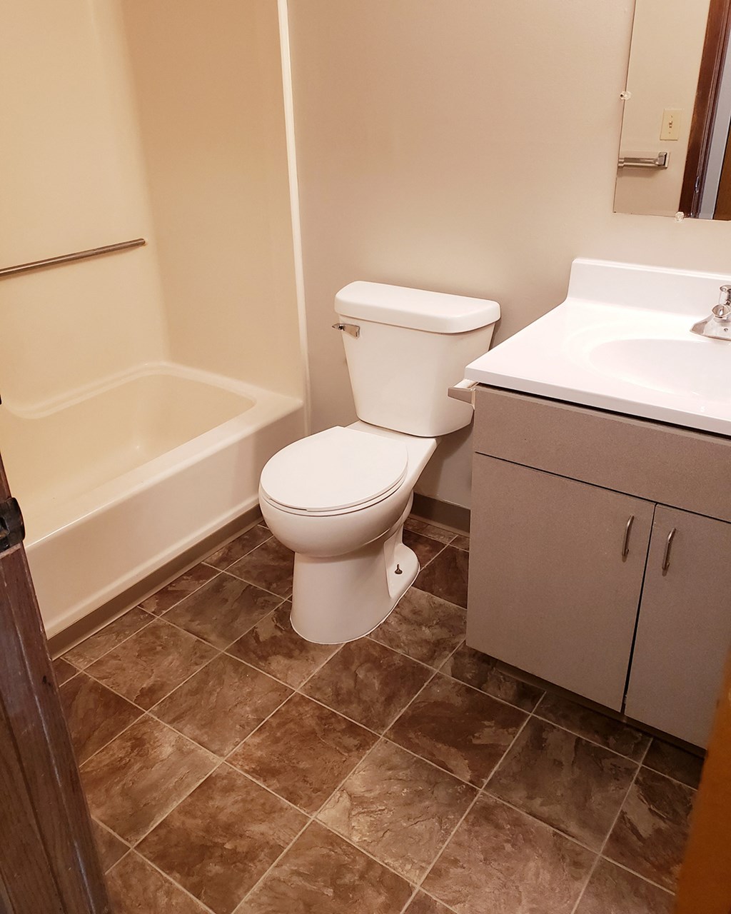 an image of a bathroom with a toilet and a sink