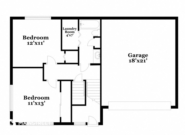 floor plan of the first floor of the house with bedrooms andgarage