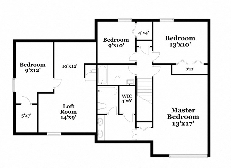 floor plan of the first level of the house with bedrooms and baths