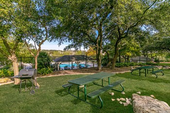 Outdoor grill and picnic area with pool view - Photo Gallery 28